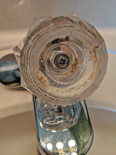 clean crystal faucet head.