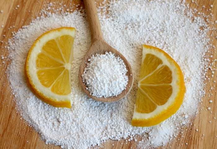citric acid to remove white film from dishes
