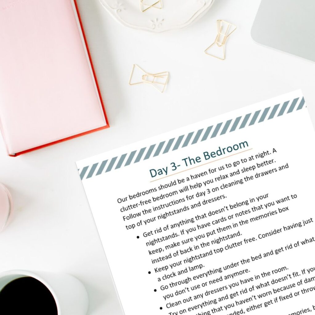 A printed sheet of decluttering goals laying on a desk.